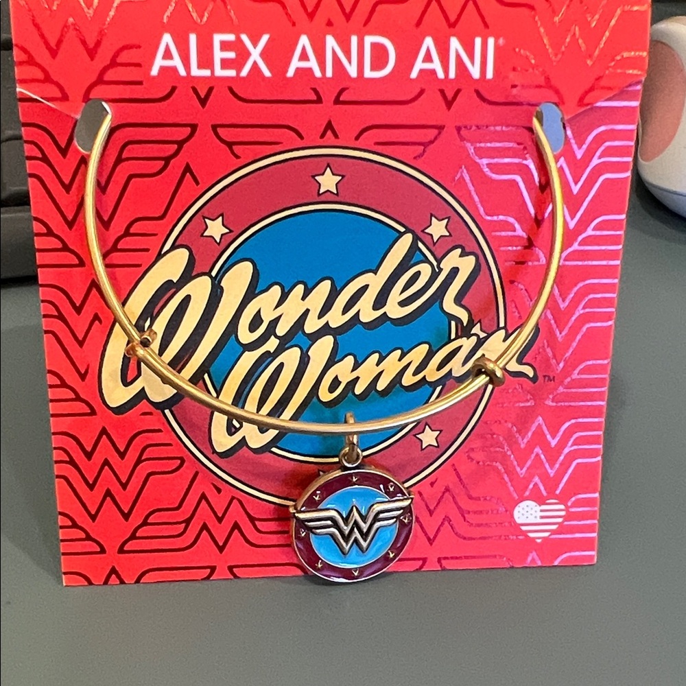 Alex and Ani Gold Wonder Woman Bracelet with Blue Charm